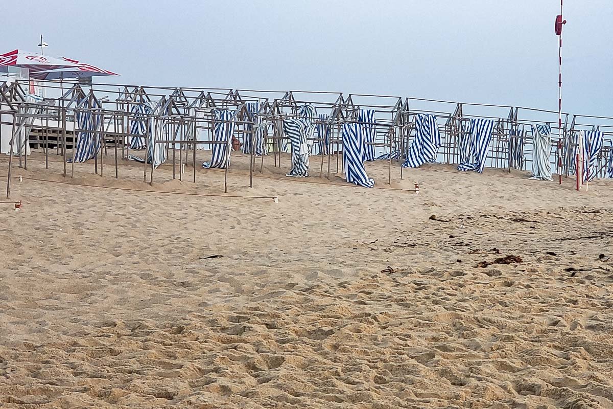 download_2 Striped beach cabanas in daylight, Mindelo