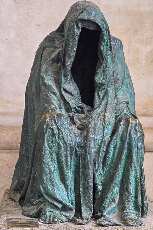 watchers_6 A shrouded bronze figure in heavy drapery, face completely hidden, unsettling presence