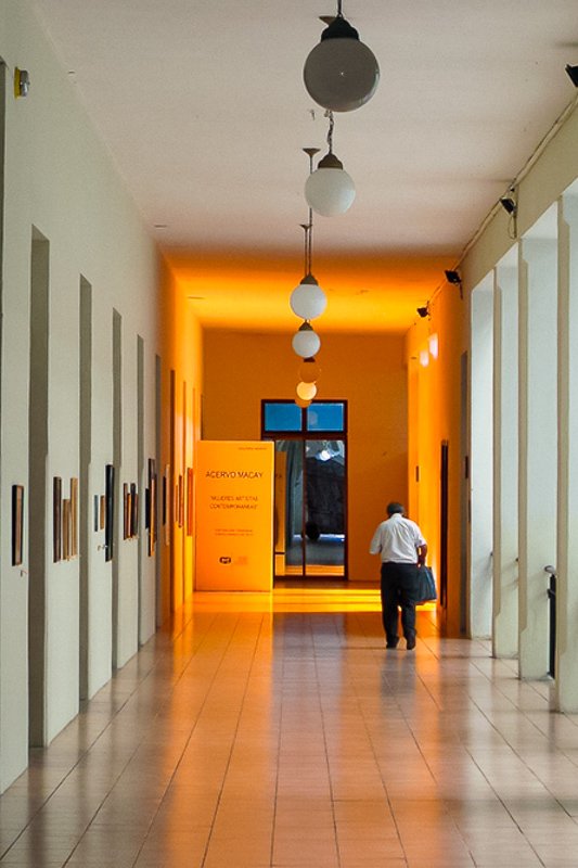 door windows_10 Man walking to the door down a long hallway