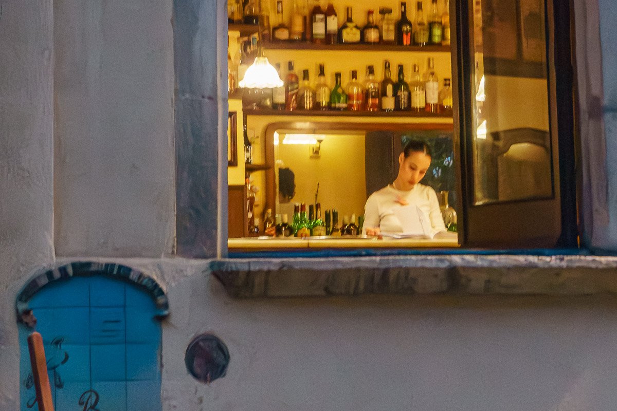 door windows_23 Women bartender in restaurant