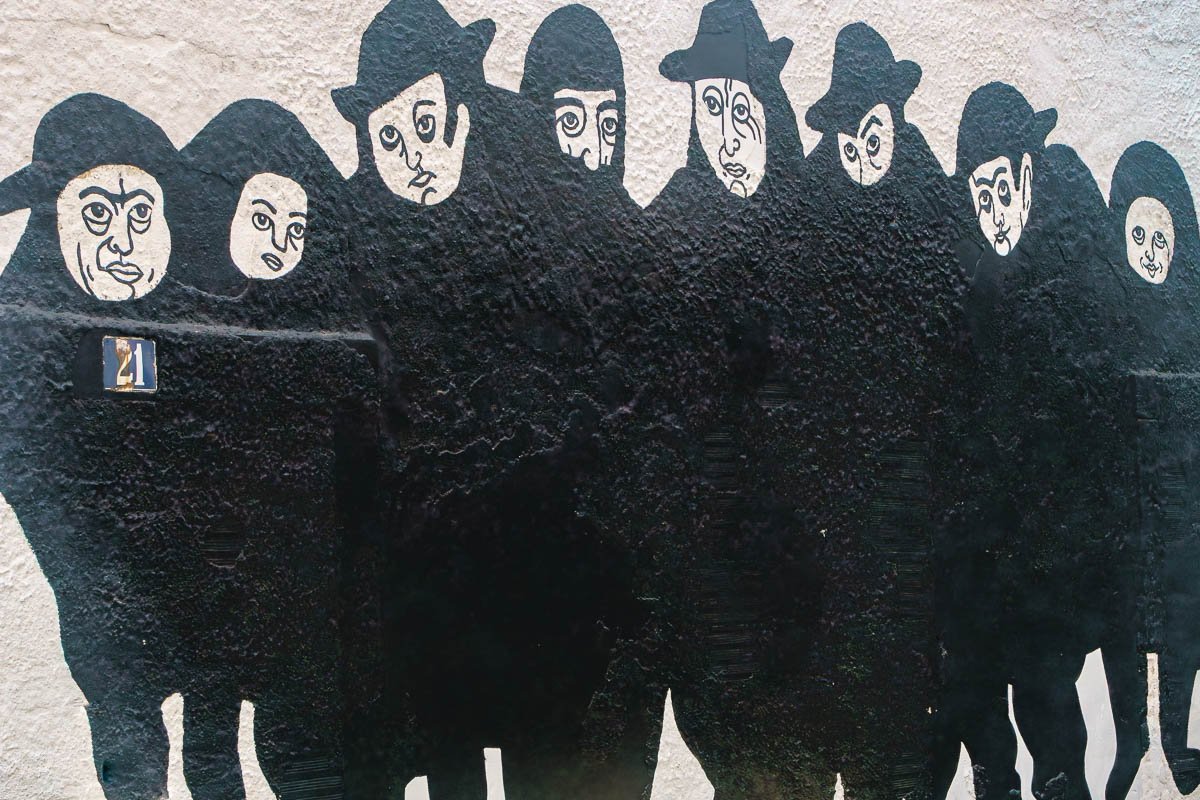 watchers_1 Grafetti showing men dressed in black with bowler hats